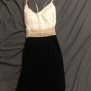 Black and white mid thigh dress with thin straps